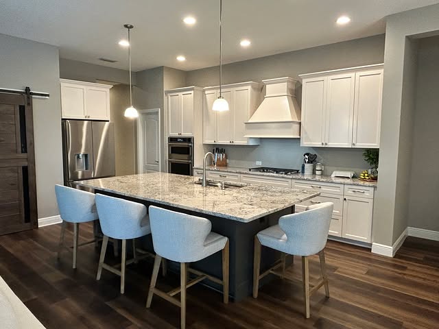 Before and after kitchen install in Shoji White